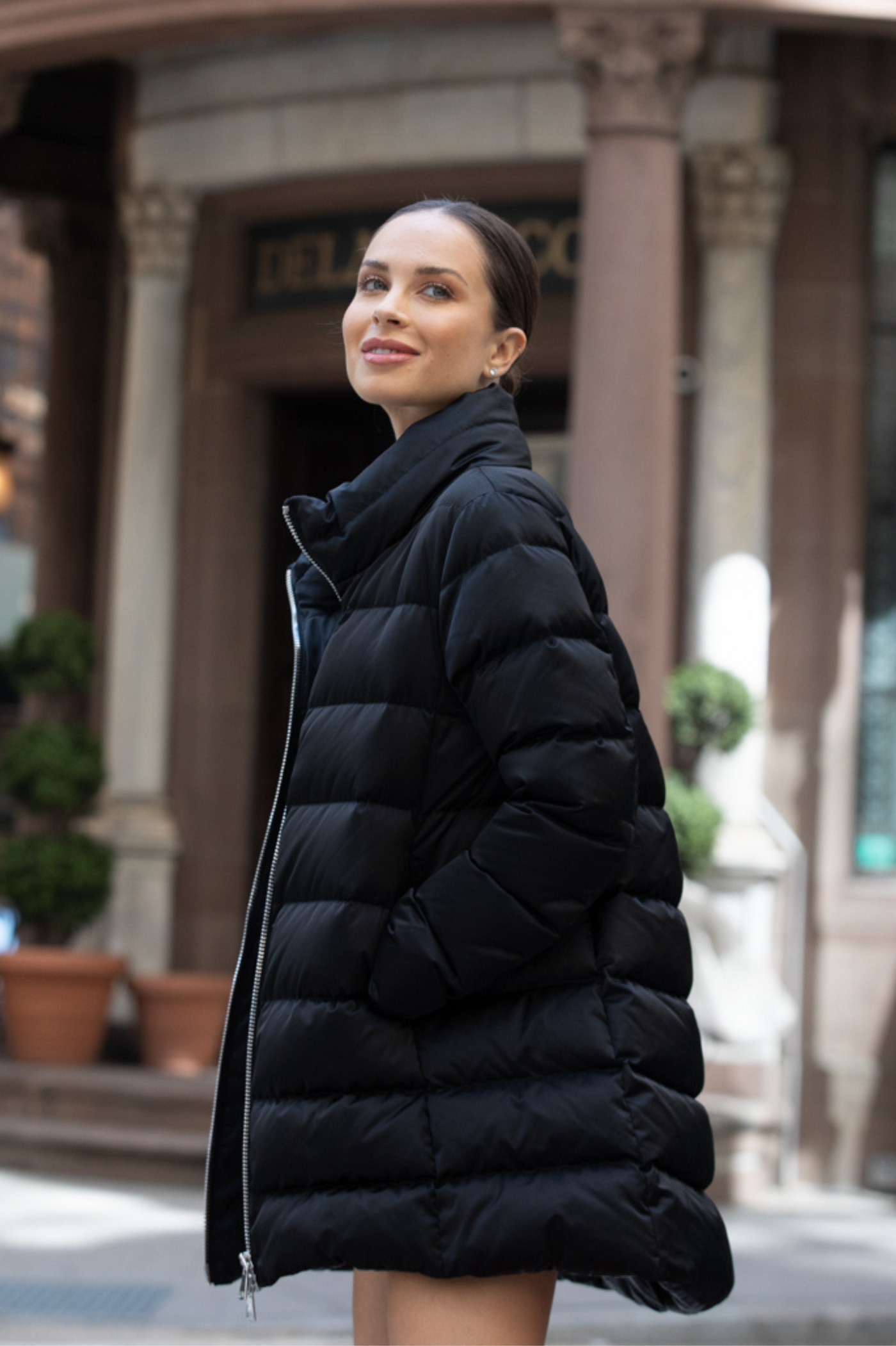 Down coat with side top zippers